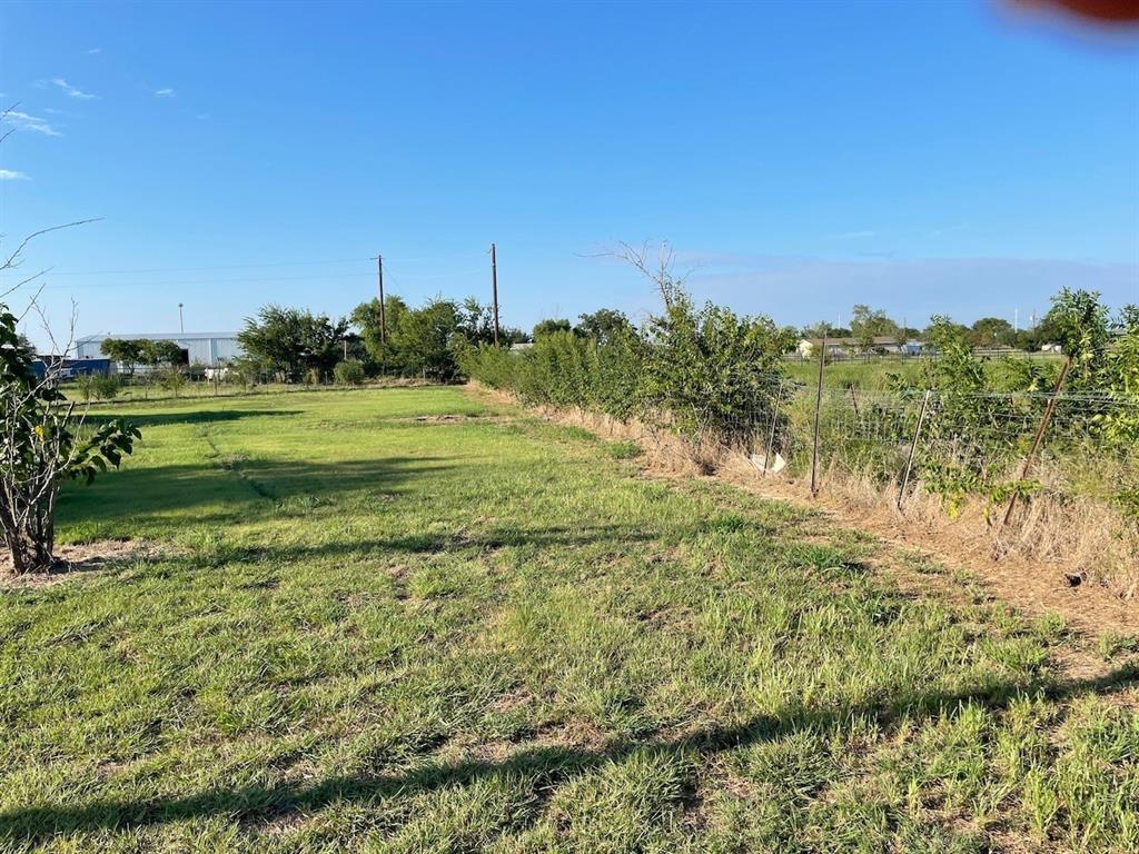 18636 Doubletree Drive Justin, TX 76247 - Photo 31 of 35 a view of a lake with a big yard
