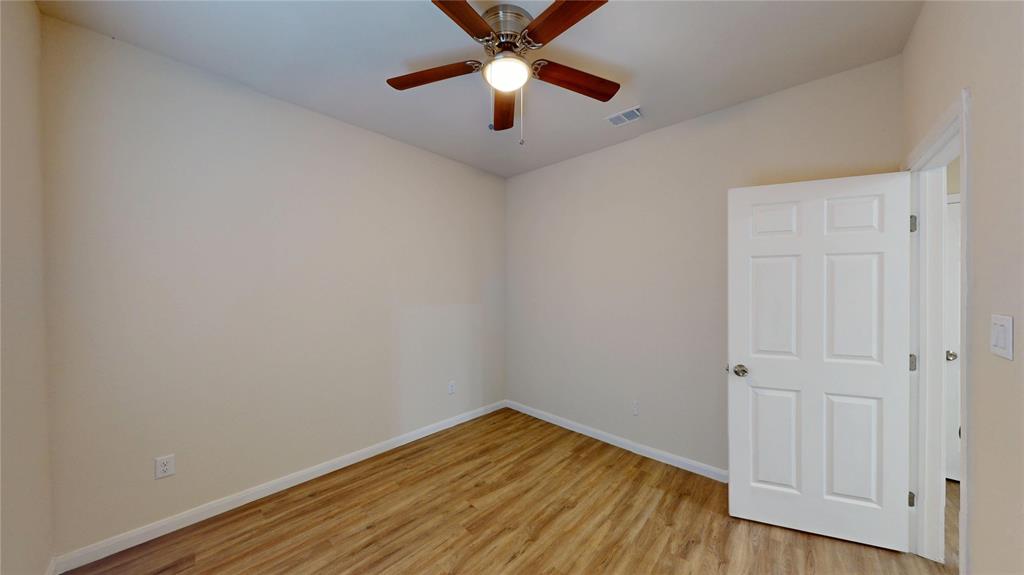 18636 Doubletree Drive Justin, TX 76247 - Photo 10 of 35 a view of empty room with wooden floor
