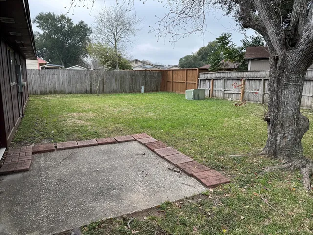 a view of a backyard with a garden