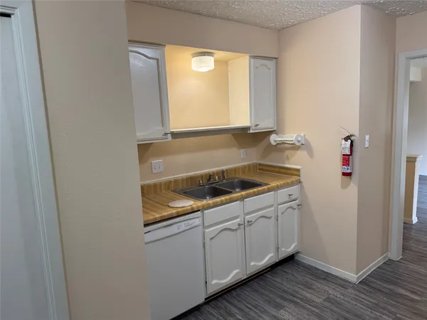 a bathroom with a sink and a window