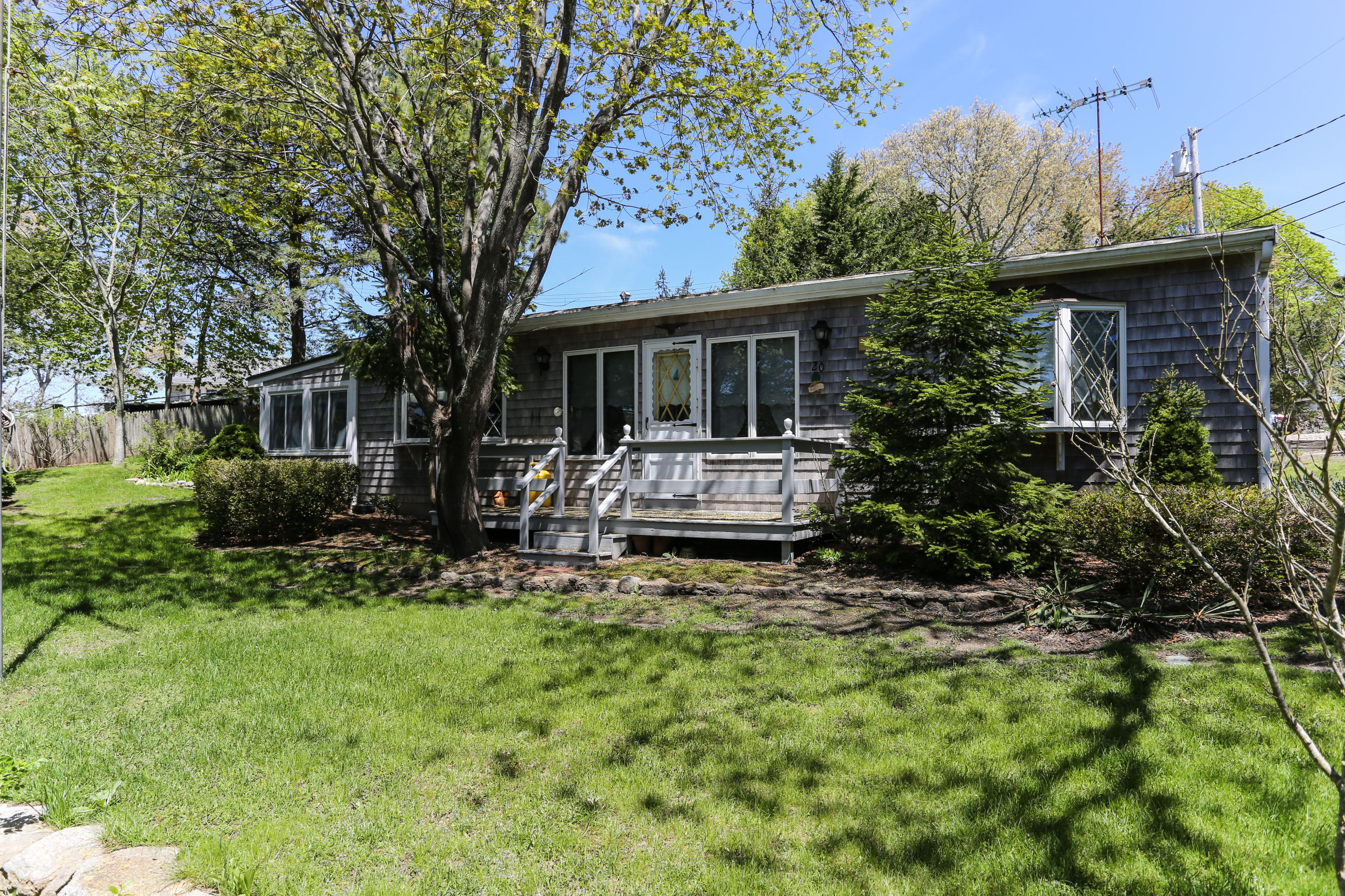 20 Over Jordan Road Wareham, MA 02571 - Photo 21 of 25 a front view of a house with garden
