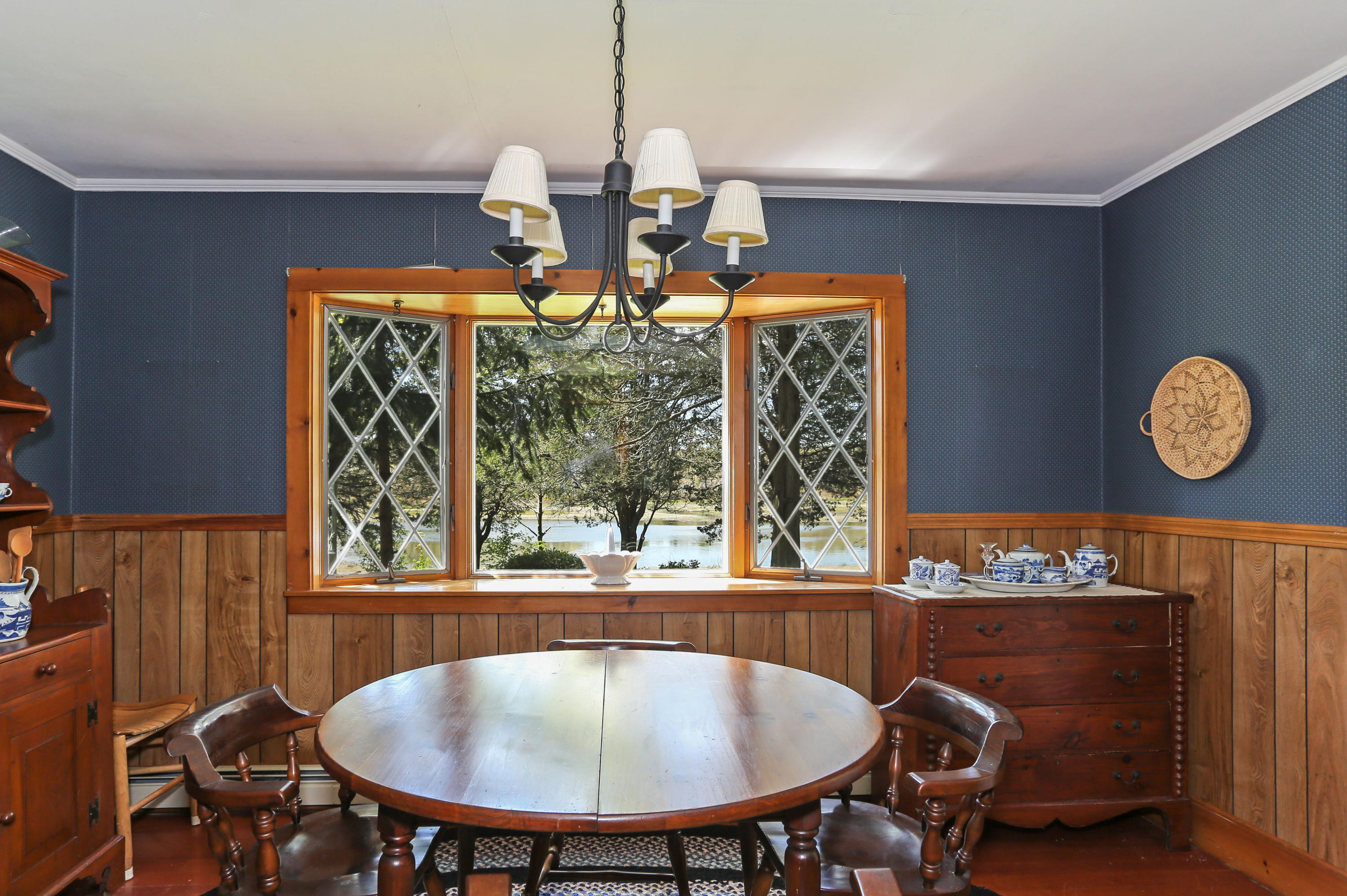 20 Over Jordan Road Wareham, MA 02571 - Photo 7 of 25 a view of a dining room with furniture window and outside view