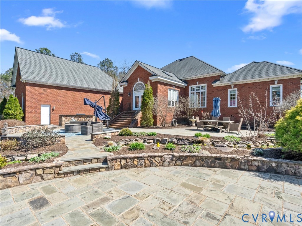 24200 Pear Orchard Road Moseley, VA 23120 - Photo 13 of 66 Rear view of property, koi pond and large blue sto
