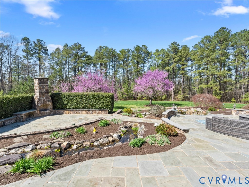 24200 Pear Orchard Road Moseley, VA 23120 - Photo 14 of 66 Rear view of property, koi pond and large blue sto
