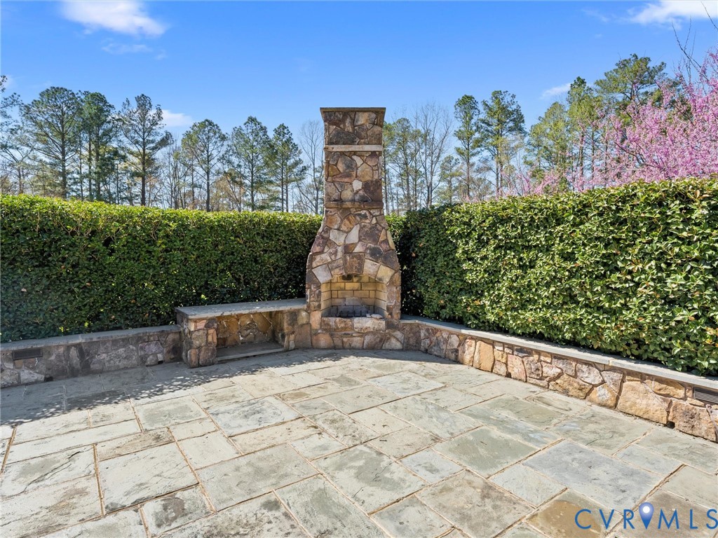 24200 Pear Orchard Road Moseley, VA 23120 - Photo 15 of 66 Rear view of property, koi pond and large blue sto