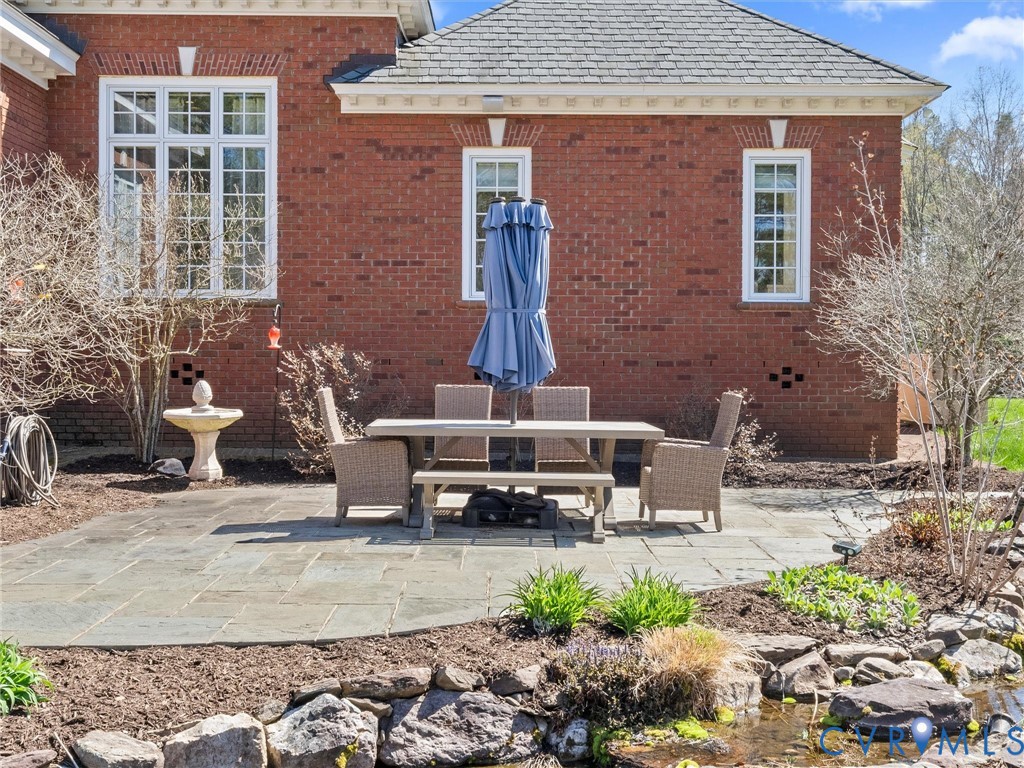 24200 Pear Orchard Road Moseley, VA 23120 - Photo 16 of 66 Rear view of property, koi pond and large blue sto