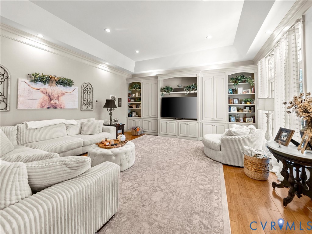 24200 Pear Orchard Road Moseley, VA 23120 - Photo 25 of 66 a living room with furniture and wooden floor