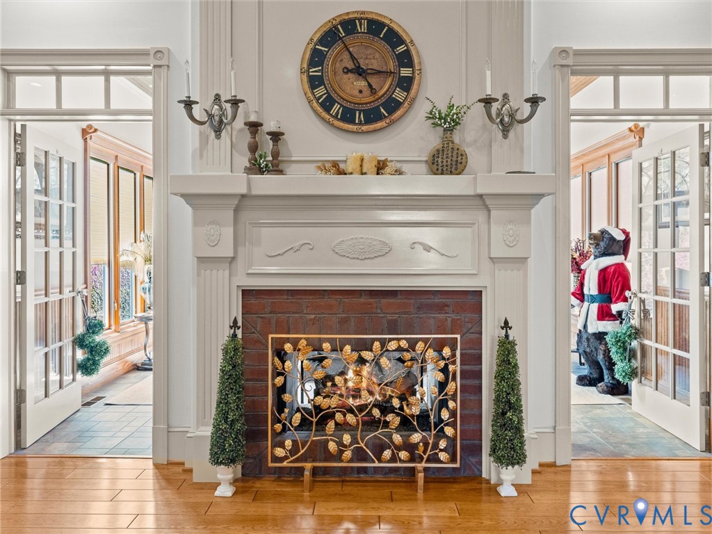24200 Pear Orchard Road Moseley, VA 23120 - Photo 41 of 66 Double sided fireplace to living room and dining r