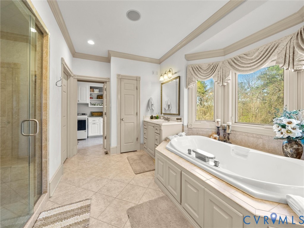 24200 Pear Orchard Road Moseley, VA 23120 - Photo 45 of 66 Primary bathroom with soaking jetted tub, dual van