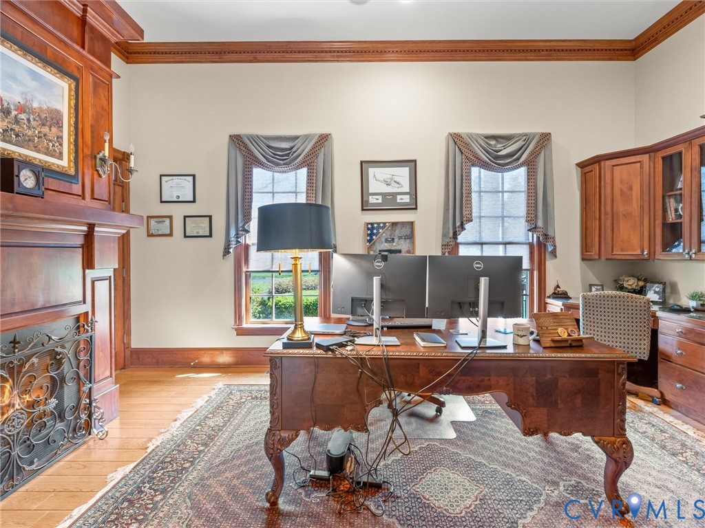 24200 Pear Orchard Road Moseley, VA 23120 - Photo 48 of 66 Office with fireplace and custom built-in cabinets
