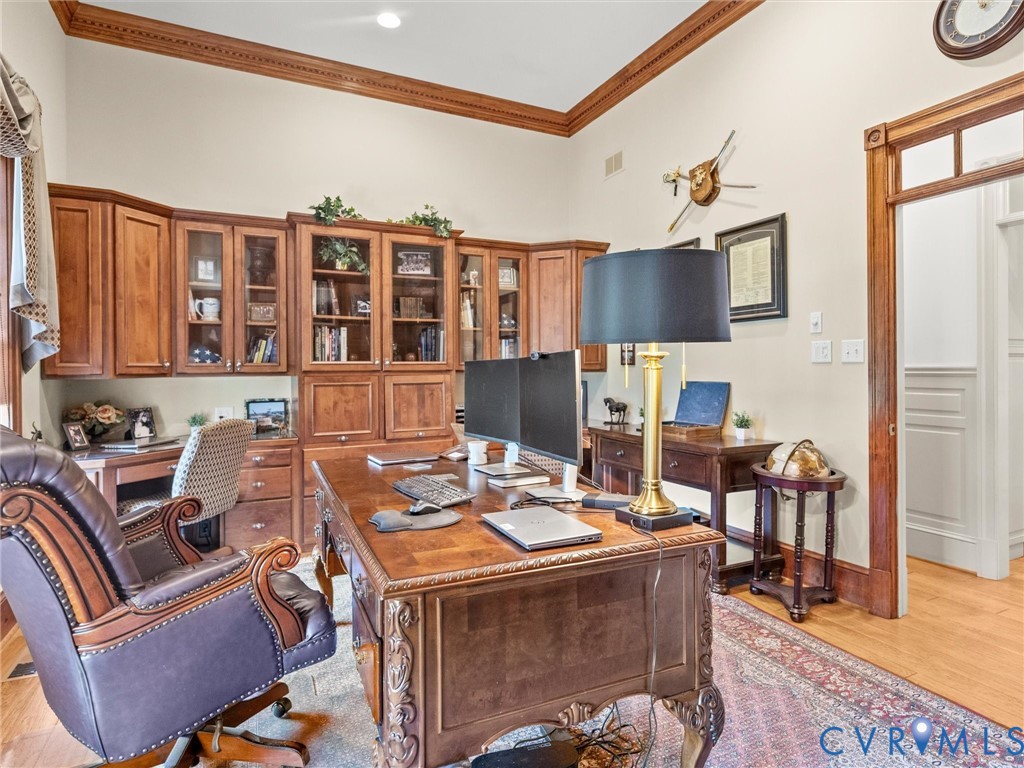 24200 Pear Orchard Road Moseley, VA 23120 - Photo 49 of 66 Office with fireplace and custom built-in cabinets