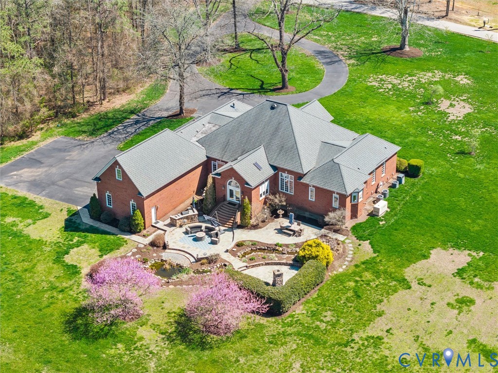 24200 Pear Orchard Road Moseley, VA 23120 - Photo 9 of 66 an aerial view of a house with swimming pool garden and patio
