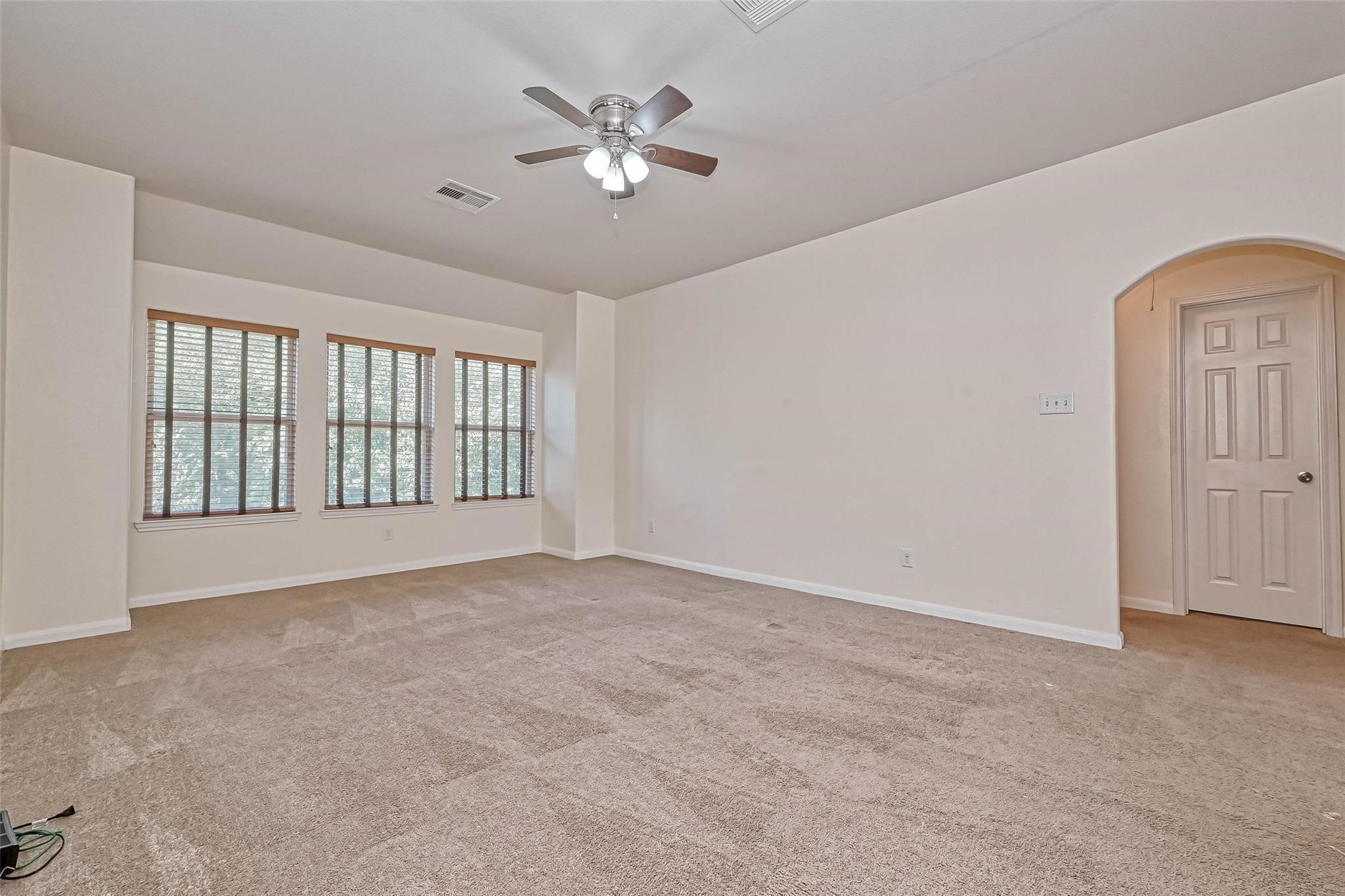 20555 Bonds Creek Lane Spring, TX 77388 - Photo 16 of 36 a view of an empty room with a window