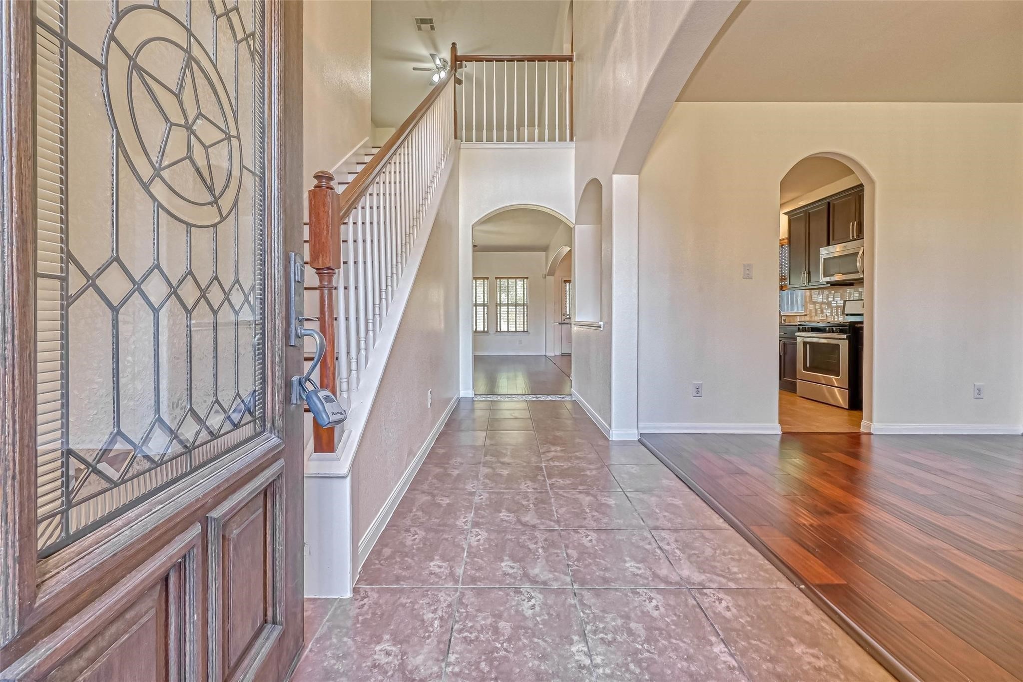 20555 Bonds Creek Lane Spring, TX 77388 - Photo 33 of 36 a view of an entryway with wooden floor