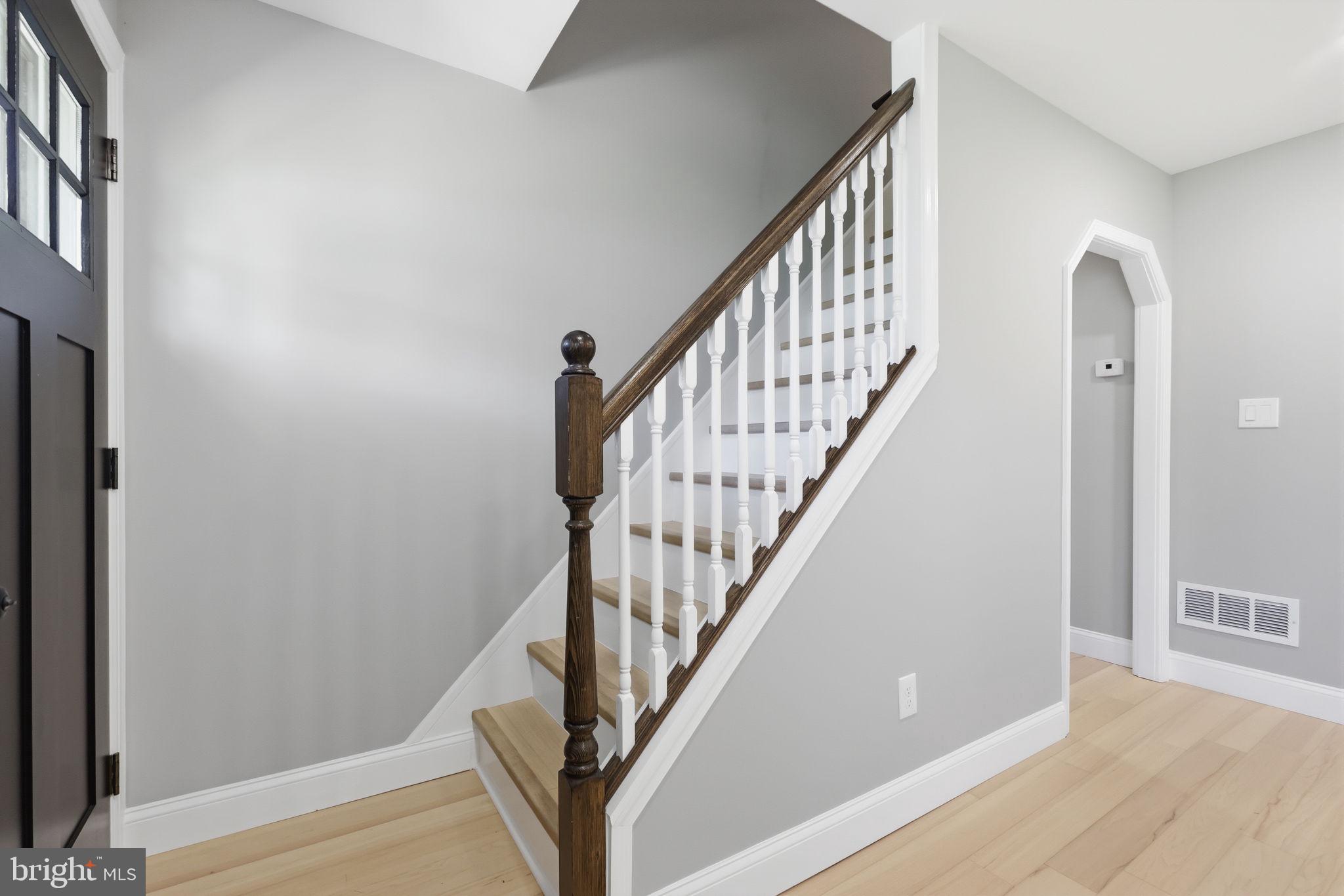 340 West Broad Street Hatfield, PA 19440 - Photo 31 of 55 a view of staircase with wooden floor and white walls
