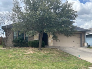 a house with trees in front of it