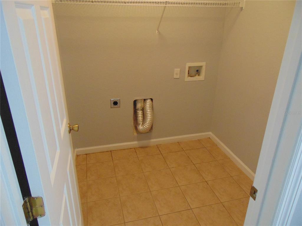 2946 Conner Lane Kissimmee, FL 34741 - Photo 10 of 13 a bathroom with a shower
