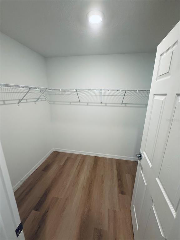 12 Slipper Flower Path East Palm Coast, FL 32164 - Photo 12 of 36 a view of a room with racks on the wall