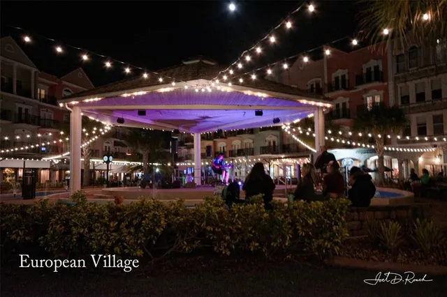a view of a chairs and tables in a patio