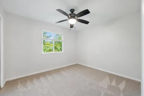 a kitchen with a sink and a window