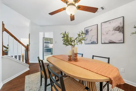 a kitchen with a sink cabinets and stainless steel appliances