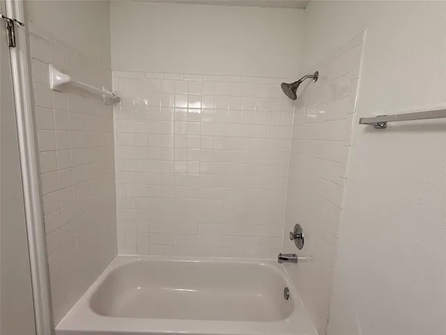 a close view of a bathtub in bathroom