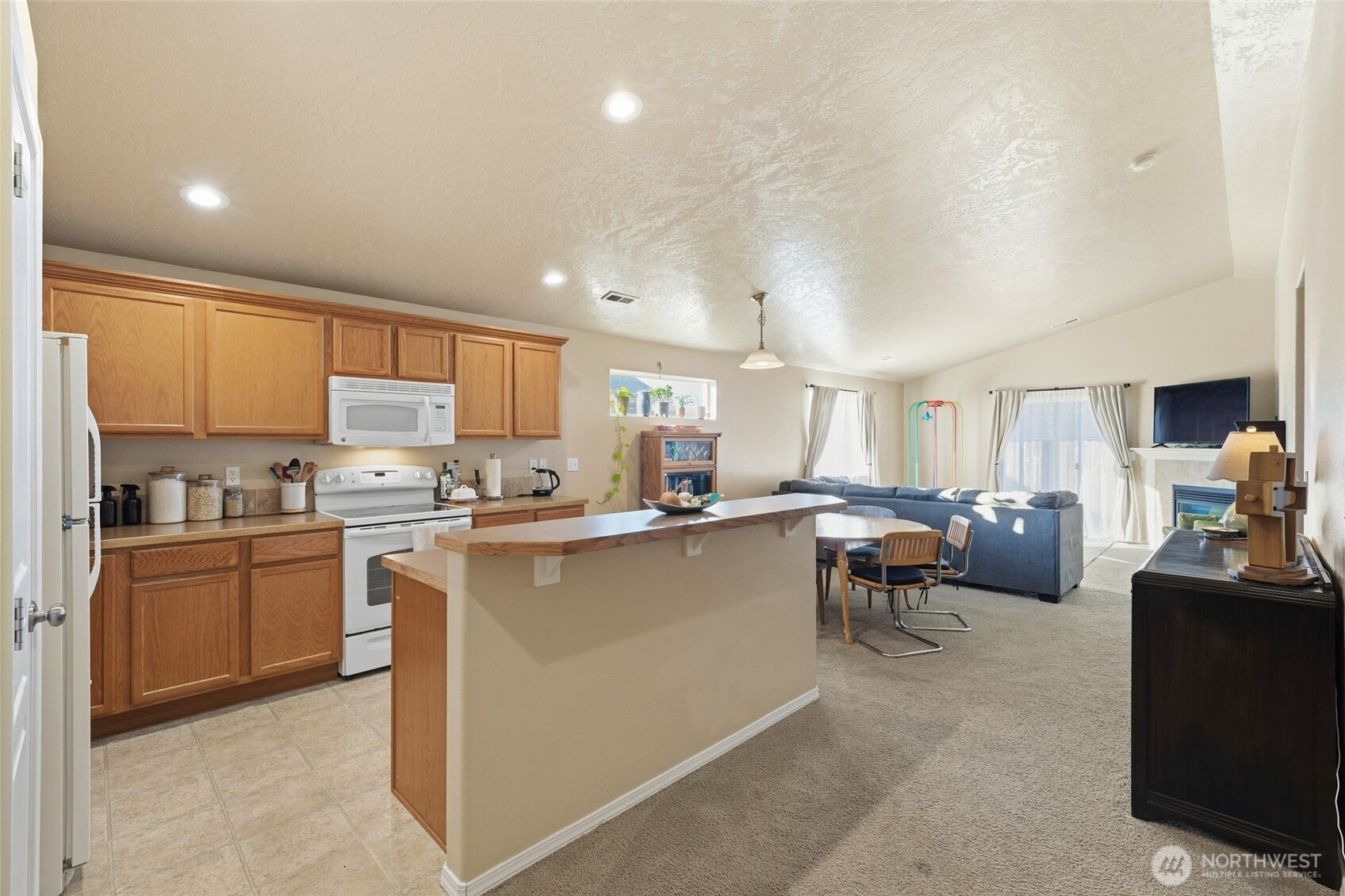 304 Southwest Homestead Avenue College Place, WA 99324 - Photo 10 of 21 a kitchen with cabinets a sink and appliances
