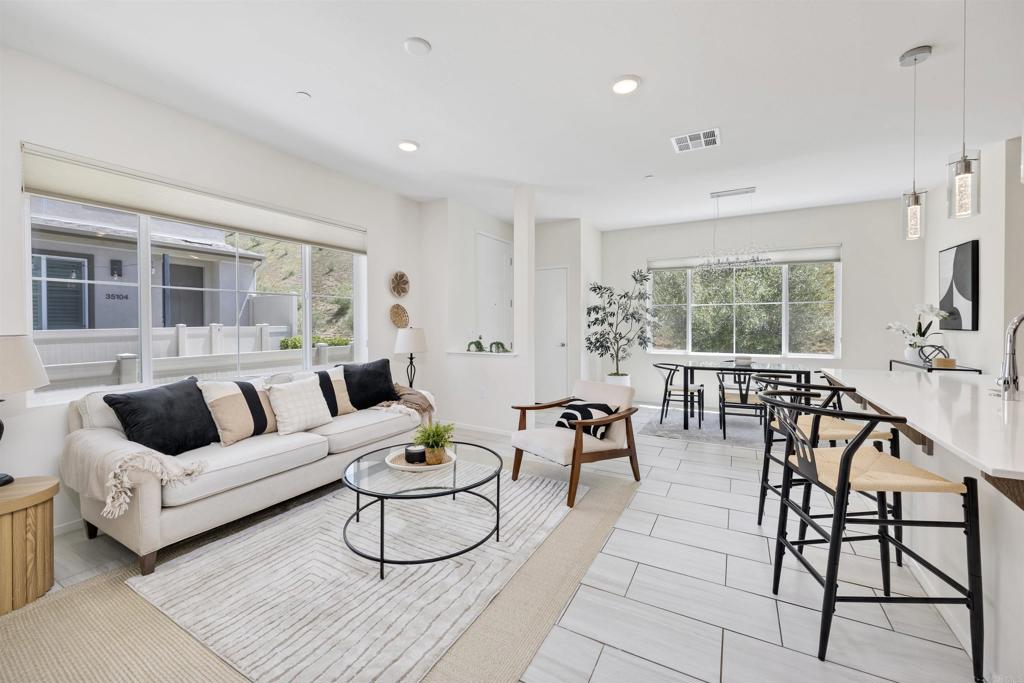 35103 Vine Place Fallbrook, CA 92028 - Photo 17 of 42 a living room with furniture and a large window