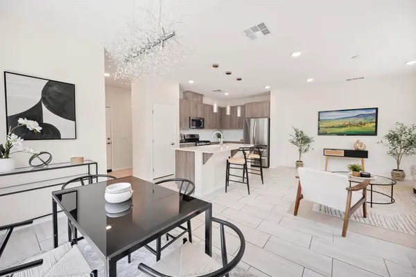 a view of kitchen with cabinets and wooden floor