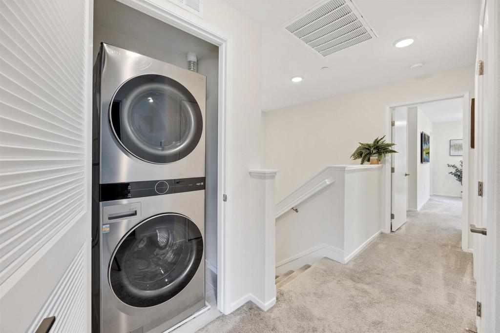 35103 Vine Place Fallbrook, CA 92028 - Photo 26 of 42 a view of a hallway with washer and dryer