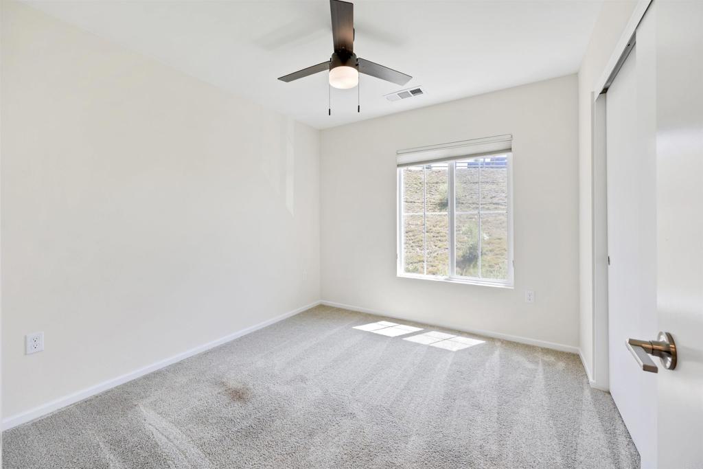 35103 Vine Place Fallbrook, CA 92028 - Photo 27 of 42 a view of an empty room with a window