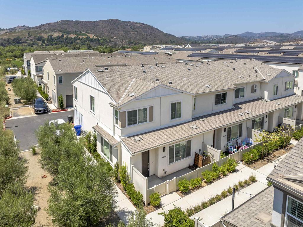 35103 Vine Place Fallbrook, CA 92028 - Photo 40 of 42 an aerial view of multiple houses with a yard