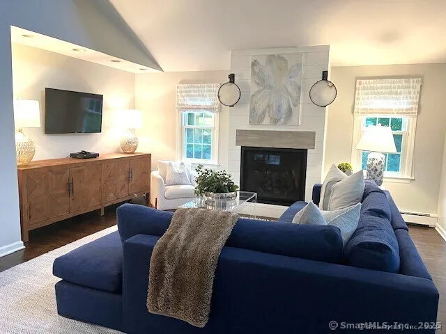 a bathroom with a sink and a large mirror