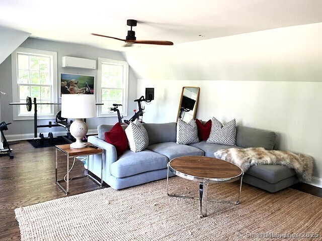200 West Norwalk Road Norwalk, CT 06850 - Photo 8 of 9 a living room with furniture and a large window