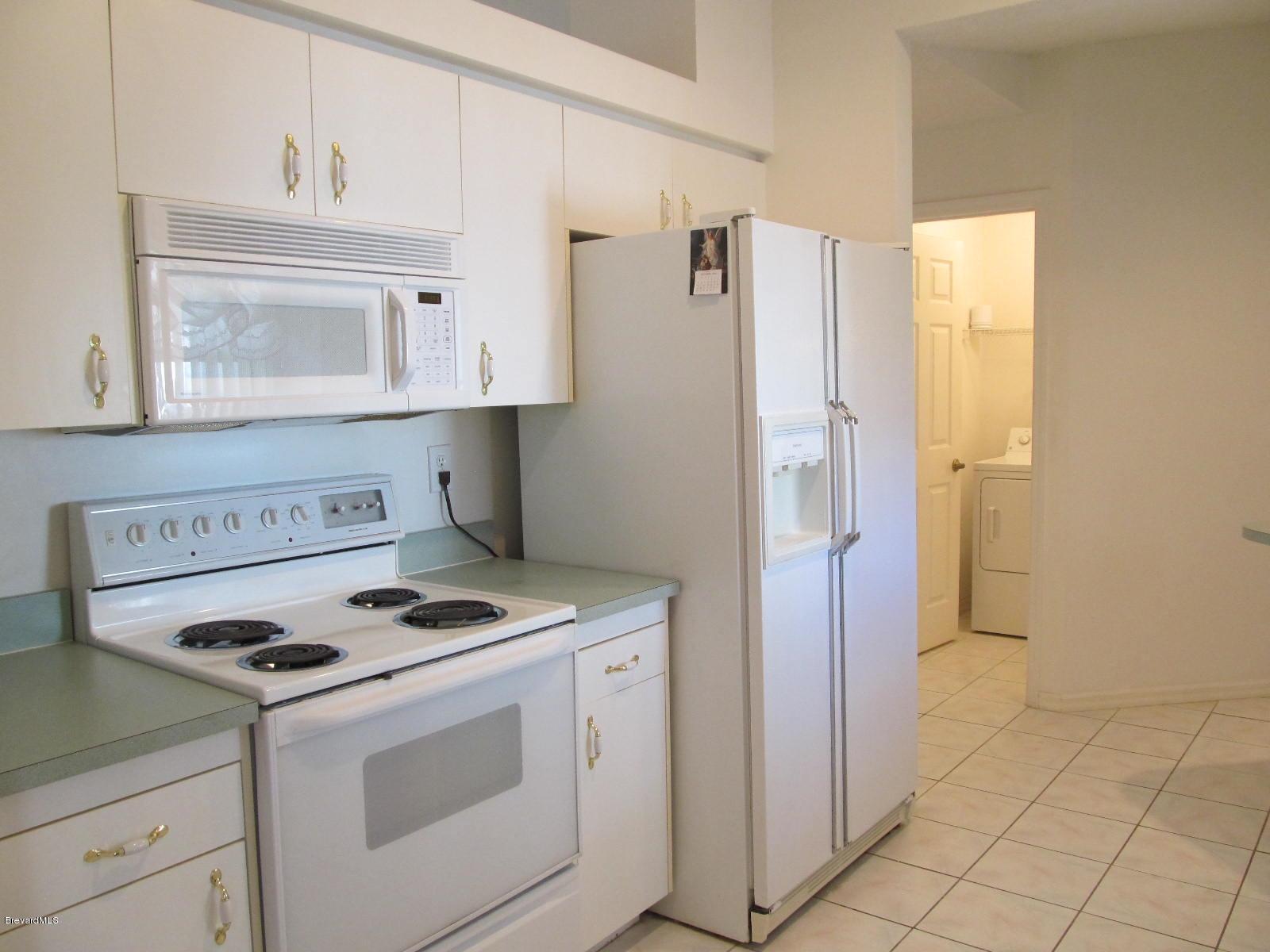198 Twin Lakes Road Melbourne, FL 32901 - Photo 14 of 26 Kitchen View from Dining Room