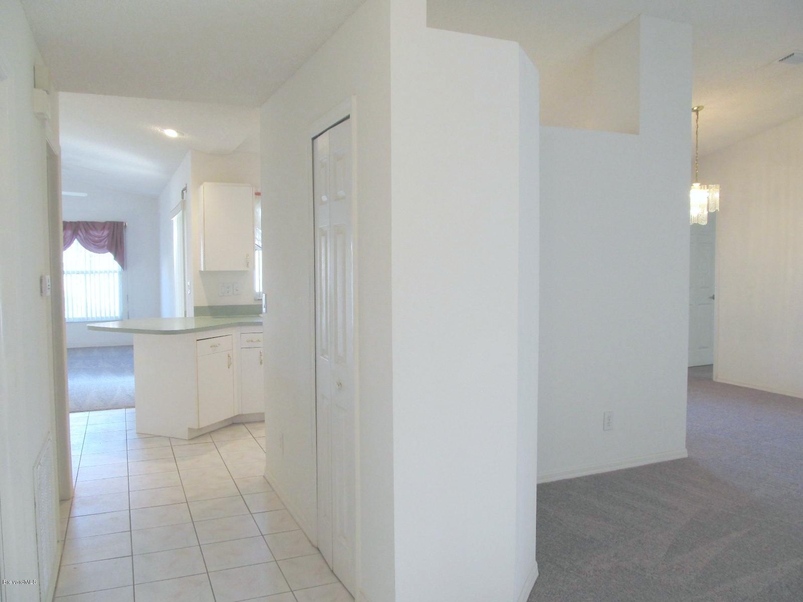 198 Twin Lakes Road Melbourne, FL 32901 - Photo 3 of 26 Foyer View