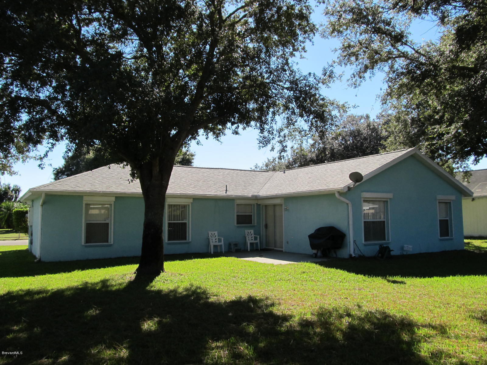 198 Twin Lakes Road Melbourne, FL 32901 - Photo 23 of 26 Exterior Back of Home