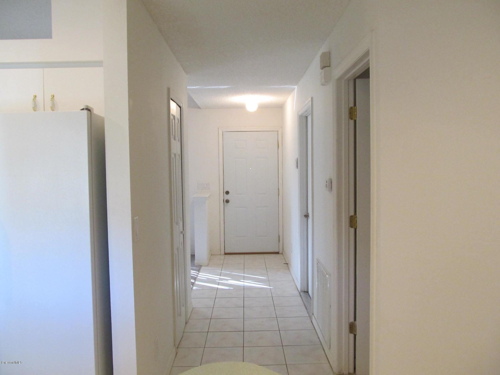 198 Twin Lakes Road Melbourne, FL 32901 - Photo 9 of 26 Foyer View from Family Room