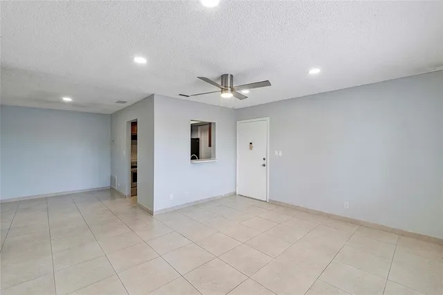 a view of room with windows and bathroom
