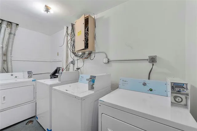 a view of bathroom with a sink and mirror
