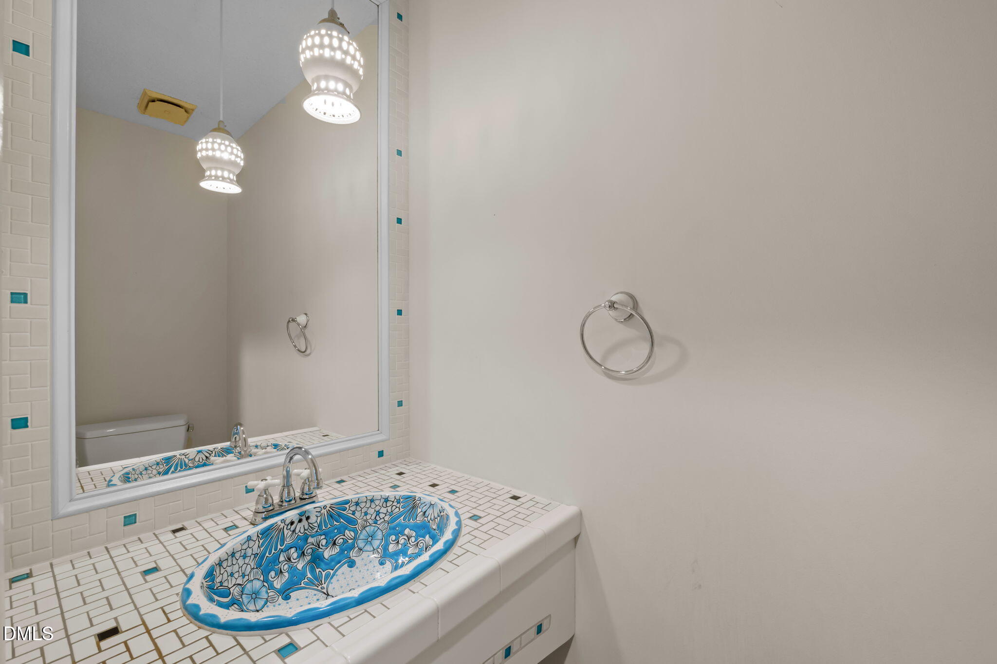206 Ridge Trail Chapel Hill, NC 27516 - Photo 13 of 32 a bathroom with a sink and a mirror