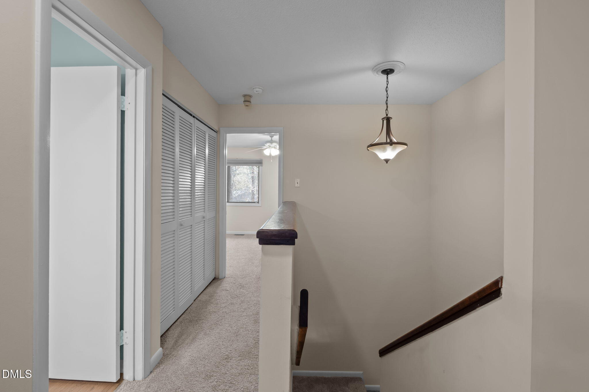 206 Ridge Trail Chapel Hill, NC 27516 - Photo 14 of 32 a view of a hallway with wooden floor