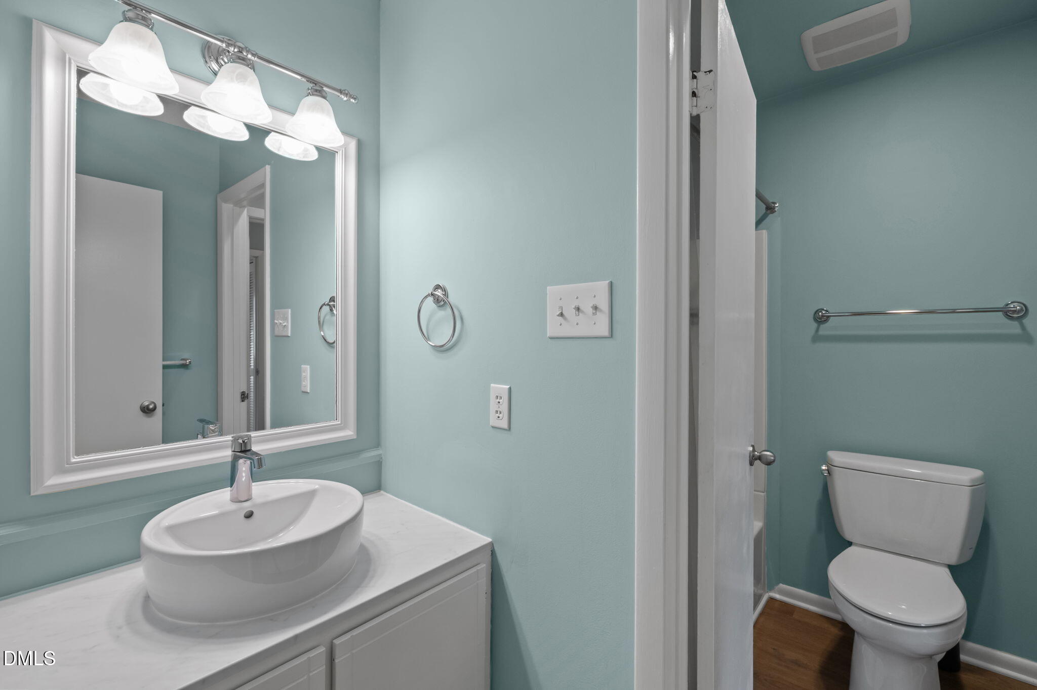 206 Ridge Trail Chapel Hill, NC 27516 - Photo 20 of 32 a bathroom with a sink a toilet and a mirror