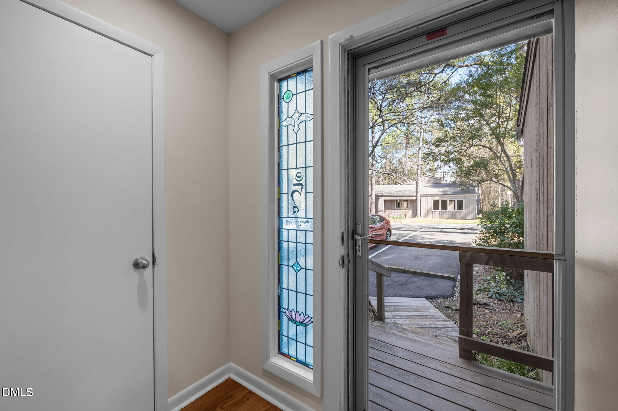 206 Ridge Trail Chapel Hill, NC 27516 - Photo 2 of 32 a view of front door with a wooden floor