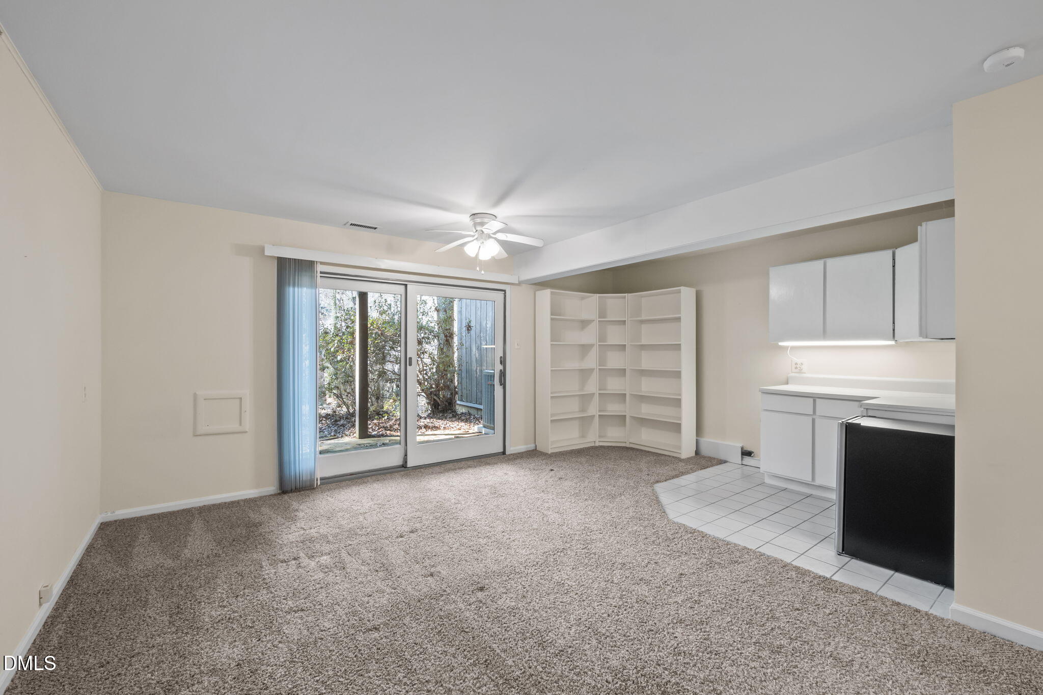 206 Ridge Trail Chapel Hill, NC 27516 - Photo 24 of 32 a view of an empty room with a fireplace and a window