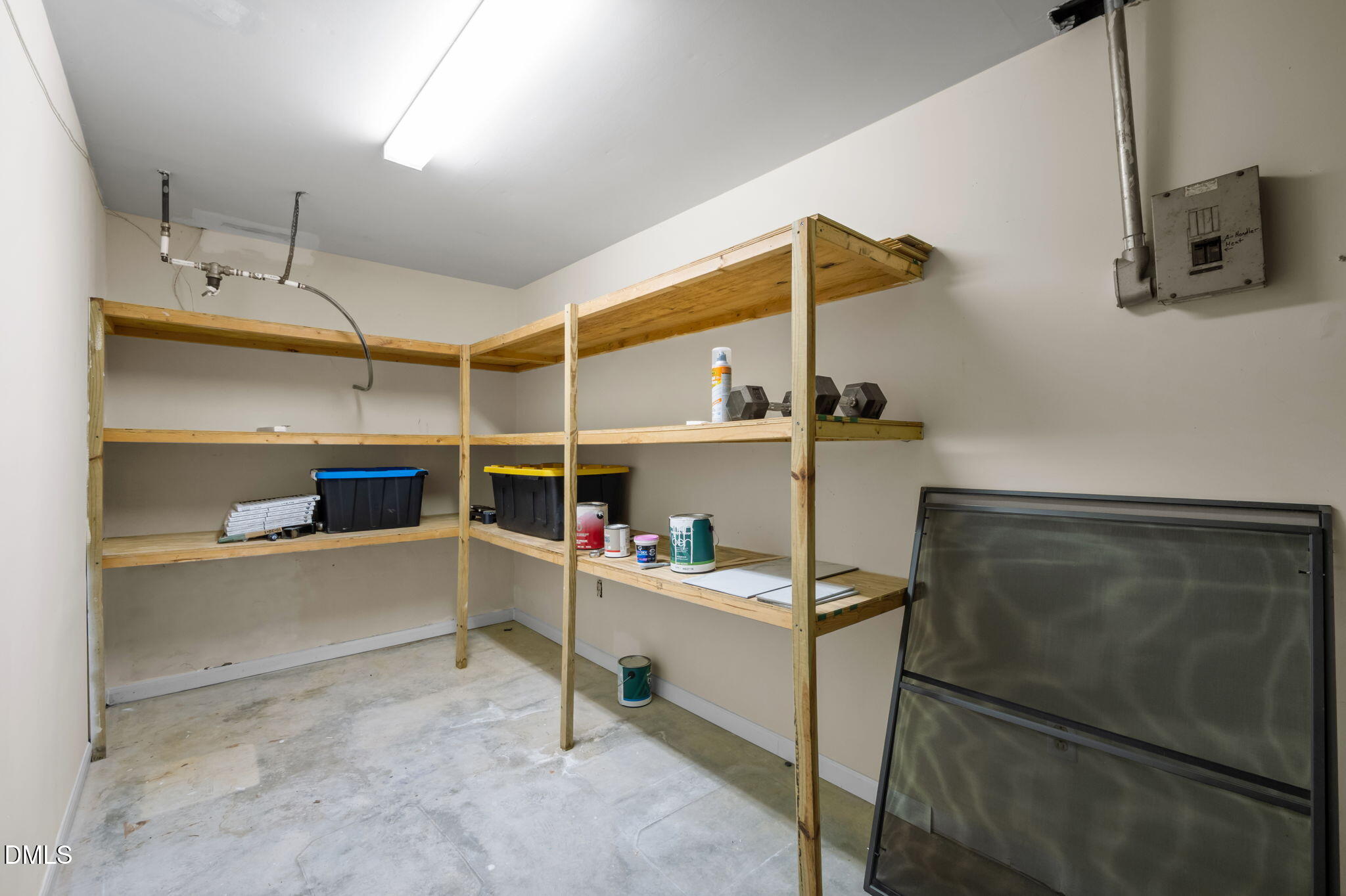 206 Ridge Trail Chapel Hill, NC 27516 - Photo 26 of 32 a view of a room with rack and cabinet