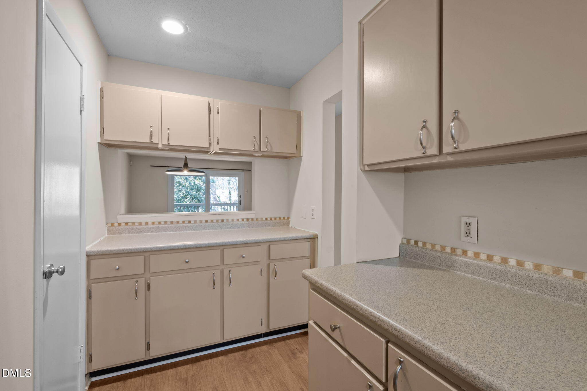 206 Ridge Trail Chapel Hill, NC 27516 - Photo 4 of 32 a kitchen with cabinets appliances and a sink
