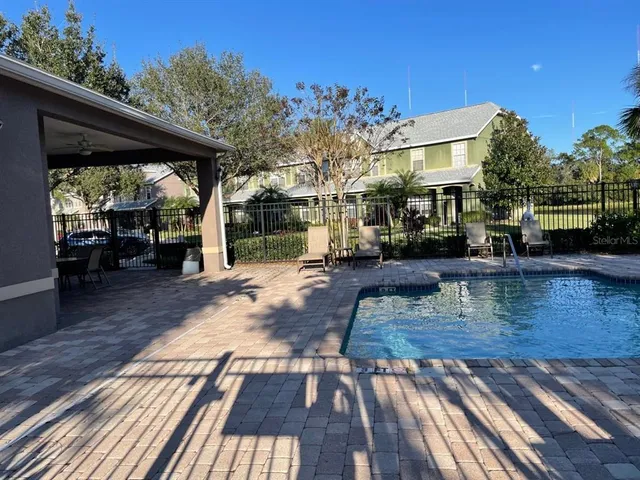 a view of a house with swimming pool