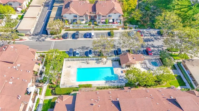 an aerial view of a houses with outdoor space