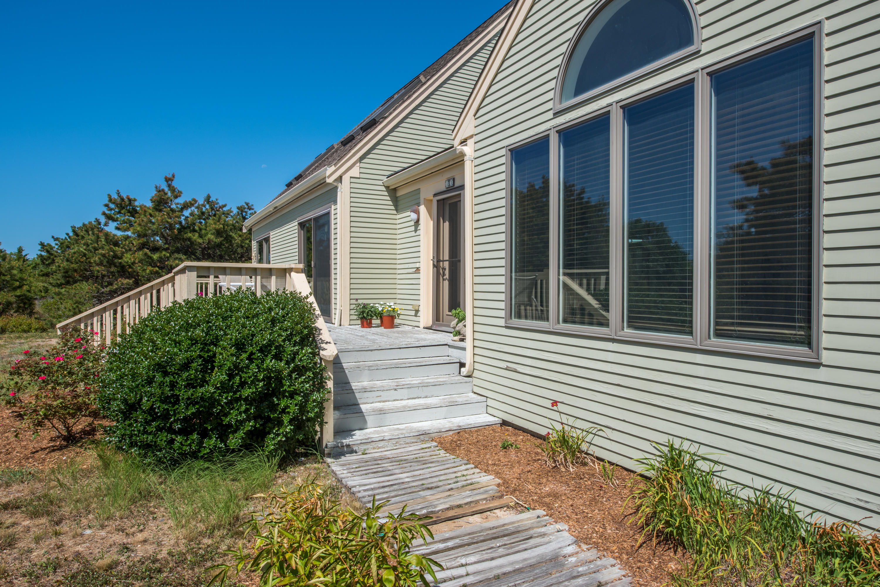 11 Pilgrim Pond Road Truro, MA 02666 - Photo 7 of 35 a view of a house with a yard